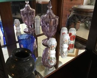 antique purple glass footed jar$45, Ainsley salt-and-pepper $14, Shirley Temple breakfast milk pitcher $18, native American/Mexico territory black pot signed $90