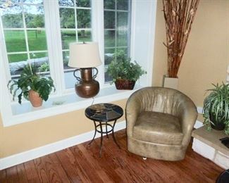 Leather swivel chair , Copper Lamp, slate top side table