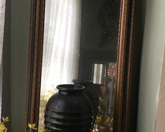 large mirror, vase