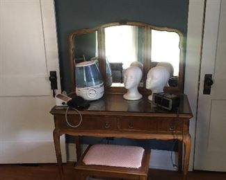 Vintage desk with mirror, wigs, vaporizer 