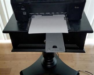 Black table. Printer