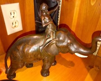 Bronze elephant and boy