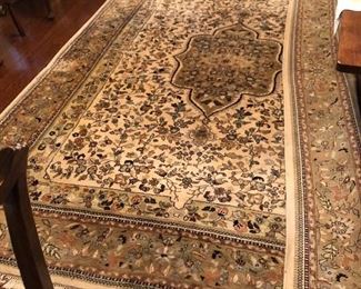 Large Persian style wool and silk blend rug currently used in the dining room. Excellent condition.  