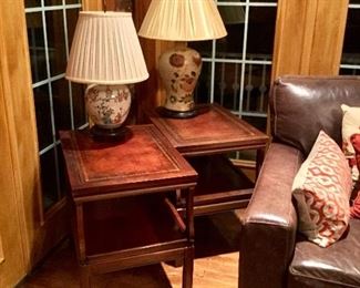 Pair of mahogany end tables with leather embossed top