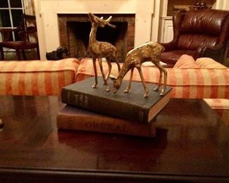 Antique books with grazing deer