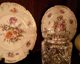 Close up of Dresden plates and Waterford Lismore biscuit jar