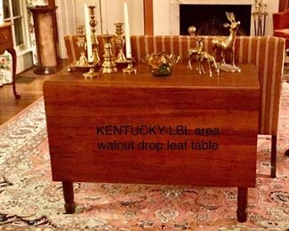 KY LBL (Land Between the Lakes). Joshua Hobson purchased the drop leaf table, cherry corner cabinet, cherry work table or storage cabinet and two coffee grinders.  Shown on the table is a portion of the brass collection.  