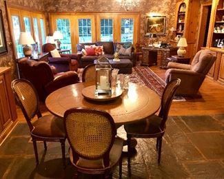 wormy chestnut table, wicker back chairs, view of family room