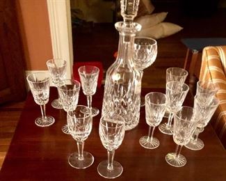 Lismore by Waterford decanter, cordials, brandy glasses and one hock wine glass