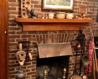 French, German wood, ceramic, copper and cast molds.  view of Kitchen fireplace.