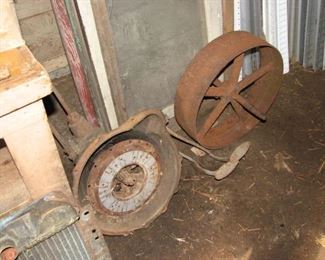 old transmission possibly model T? and iron wheel