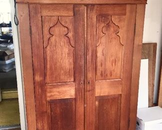 Antique tall wooden cabinet