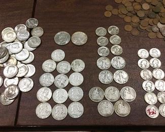Half dollars (mid 1800's to mid 1900's), 2 silver dollars, Susan B Anthony 1 dollar coins, mid-century quarters, many Indian Head pennies