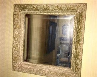 Antique beveled mirror in antique frame