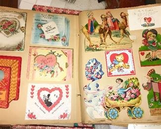A scrapbook full of vintage cards from various occasions (cards attached to book)