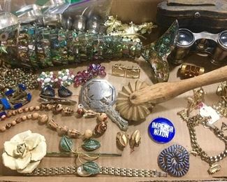 Costume jewelry, Abalone jointed fish, antique opera glasses (Paris), primitive wooden kitchen collectible!  Just a small sample of costume jewelry at this sale)