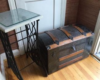 Marble plant stand and antique trunk. https://ctbids.com/#!/description/share/230644