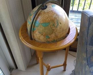 World globe in a wood stand base