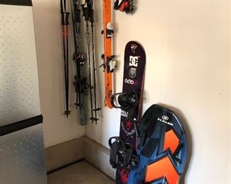 Skis, snowboard, boots and sleds