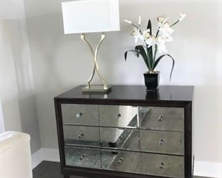 Small mirror front dresser