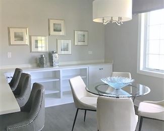 Counter height stools, small dinette set, wall art.
