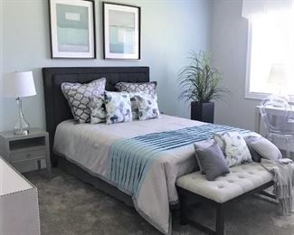 Bed (size avail soon), bench, ghost chair, nightstands, wall art.