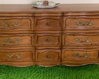 104. 9 Drawer Dresser (66" x 21" x 34")