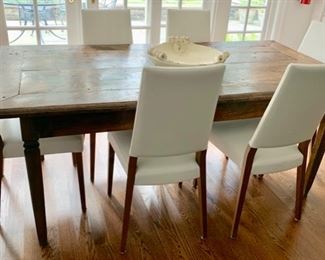 60. Tourette End French Elm Farm Table (76" x 37" x 31")
61. Set of 6 White Leather Side Chairs Made in Italy (19" x 18" x 38")