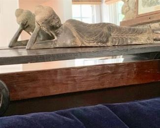64. Metal Reclining Buddha (22") 63. Asian Stool (44" x 11" x 8")