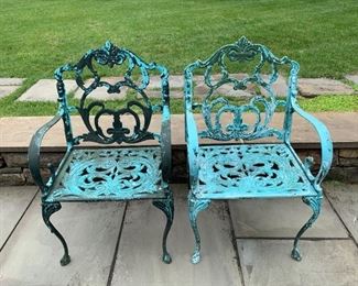 151. Antique Cast Iron Side Chairs