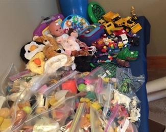 Large collection of dolls, trucks, cars and assorted toys!