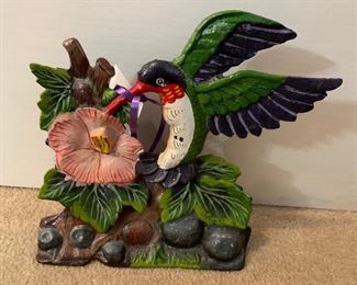 Vintage cast iron hummingbird doorstop, signed