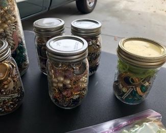 A full table of costume jewelry - no gold or sterling all costume jewelry .