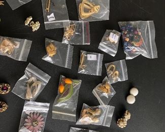 A full table of costume jewelry - no gold or sterling all costume jewelry .