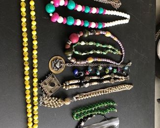 A full table of costume jewelry - no gold or sterling all costume jewelry .