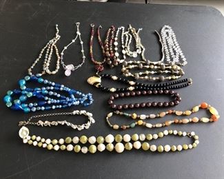 A full table of costume jewelry - no gold or sterling all costume jewelry .