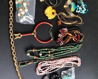 A full table of costume jewelry - no gold or sterling all costume jewelry .