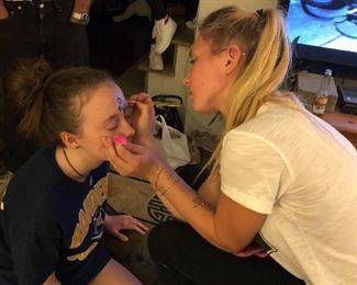 Aldyn face painting on one of her her sisters (twins 16 years old this month)!