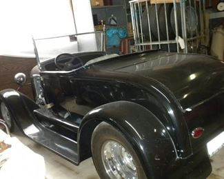 1928 FIBERGLASS BODY ROADSTER MOTOR 350 CHEVY W/NARROWED REAR END PRICE:$22,000