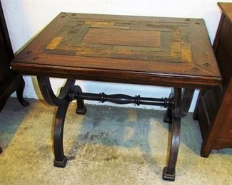 Multiple wood marquetry top on metal base, 