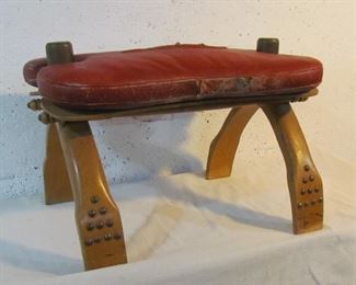 Camel seat, with leather cushion.