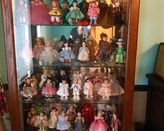 Jasper curio cabinet plus dolls of all kinds 