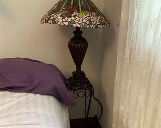 Several stained glass lamps, all different sizes.