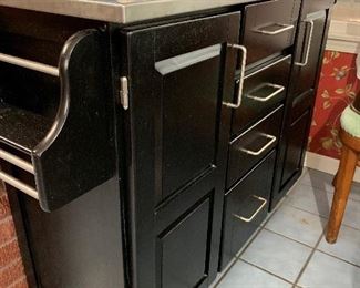 Great kitchen accessory. It has a stainless top.