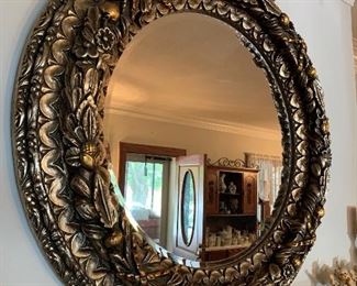 This mirror is amazing, and not as heavy as it looks.