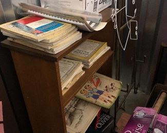 Another view of bookcase with magazines etc.