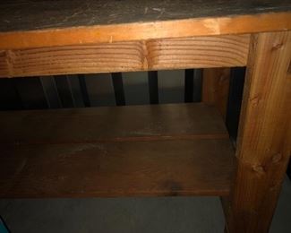 bottom shelf on workbench