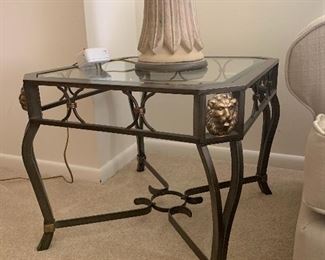 There are 2 of these elegant end tables
