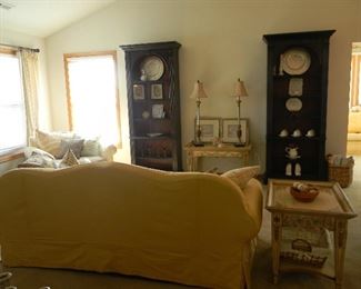 2 matching tall bookcases with subtle stenciling at the top