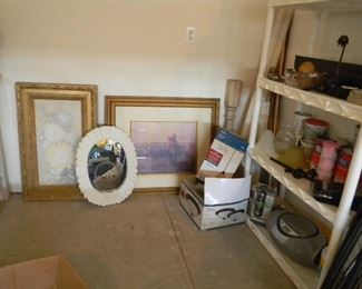 Assorted frames and prints and curtain rods